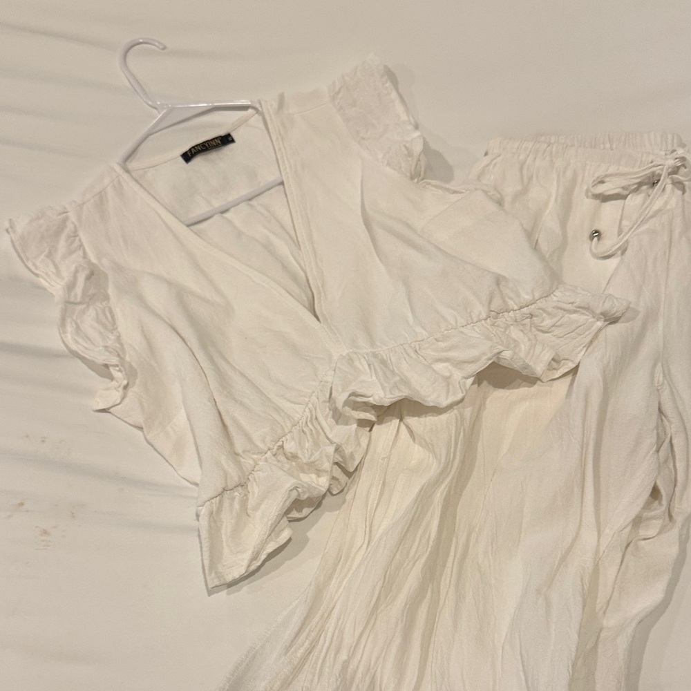 Fancyinn White Ruffled Blouse